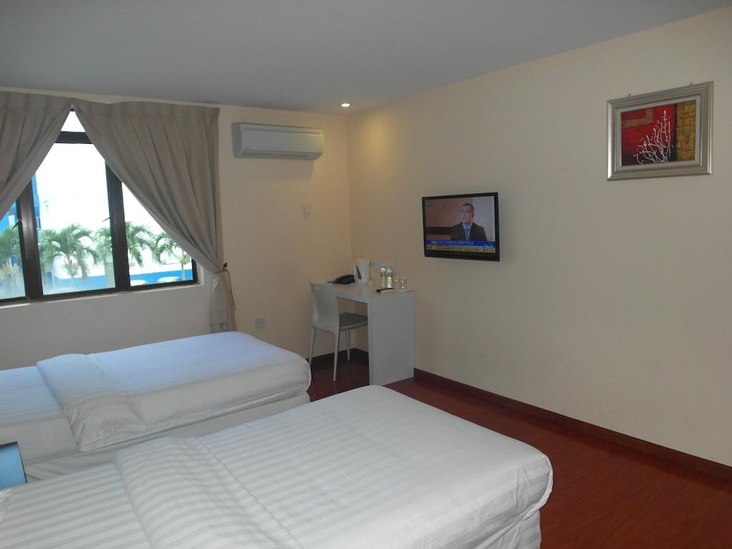 Mcity Inn Miri Zimmer foto